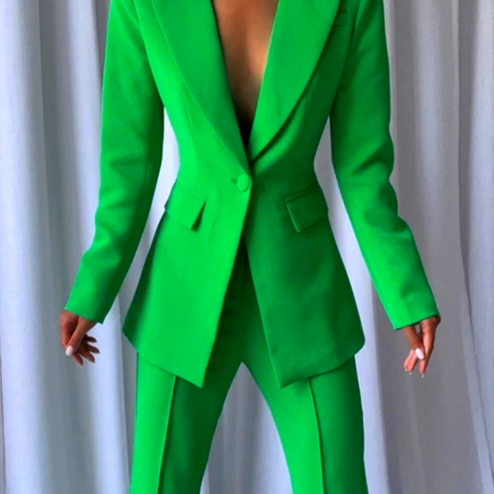 Beautiful green pants suit.
